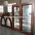 Fantastic arched oak wood window frame with carved glass for house